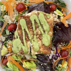 Ula Ula Cafe - Special fish of the day Grilled mac.nut crusted
Mahi Salad with quinoa, organic greens, basil, pesto, balsamic vin dressing $21.95