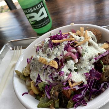 mezeh - Bowl with brown rice, half chicken shawarma and falafel, lots of veggie options and tzatziki sauce - Mediterranean Near Me - Gaithersburg, Maryland mezeh - Bowl with brown rice, half chicken shawarma and falafel, lots of veggie options and tzatziki sauce - Mediterranean Near Me - Gaithersburg, Maryland