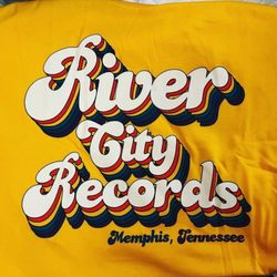 River City Records - RCR logo on Yellow T-Shirt in 70s font