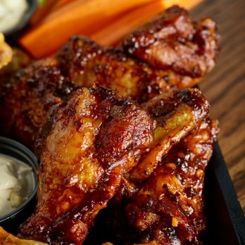 Wild Wing Cafe - chicken wings, carrots, and celery - Chicken Wings Near Me - Chesapeake, Virginia Wild Wing Cafe - chicken wings, carrots, and celery - Chicken Wings Near Me - Chesapeake, Virginia
