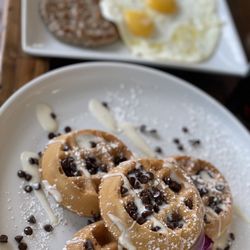 Berries & Batter Cafe - Combo - Waffles with cream cheese icing and the two eggs and sausage patties