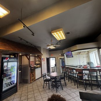 Pontillo's Pizza - Interior of restaurant looking from seating area towards the back - Pizza Near Me - Pittsford, New York Pontillo's Pizza - Interior of restaurant looking from seating area towards the back - Pizza Near Me - Pittsford, New York