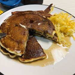 Mom's Home Cooking - Blueberry small stack with hash browns and crispy bacon.