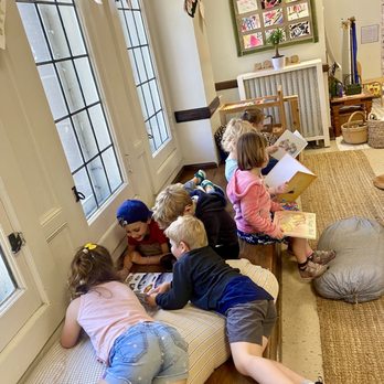 Total Child - Reading and relaxing in one of our bright, cheerful classrooms. - Child Care & Day Care Near Me - Evanston, Illinois Total Child - Reading and relaxing in one of our bright, cheerful classrooms. - Child Care & Day Care Near Me - Evanston, Illinois
