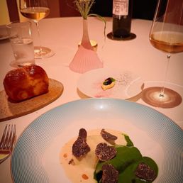 Genova Menu, Winter '24: Brioche baby bun and some kind of [not] ravioli, 2-ways with truffle shavings - loved this dish!