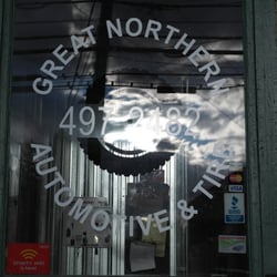 Great Northern Automotive - Window sign on lobby.