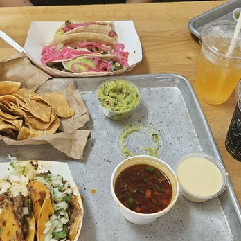 Davie Taco Bar - Birria tacos, chips and guac and taco trio - Mexican Near Me - Davie, Florida Davie Taco Bar - Birria tacos, chips and guac and taco trio - Mexican Near Me - Davie, Florida