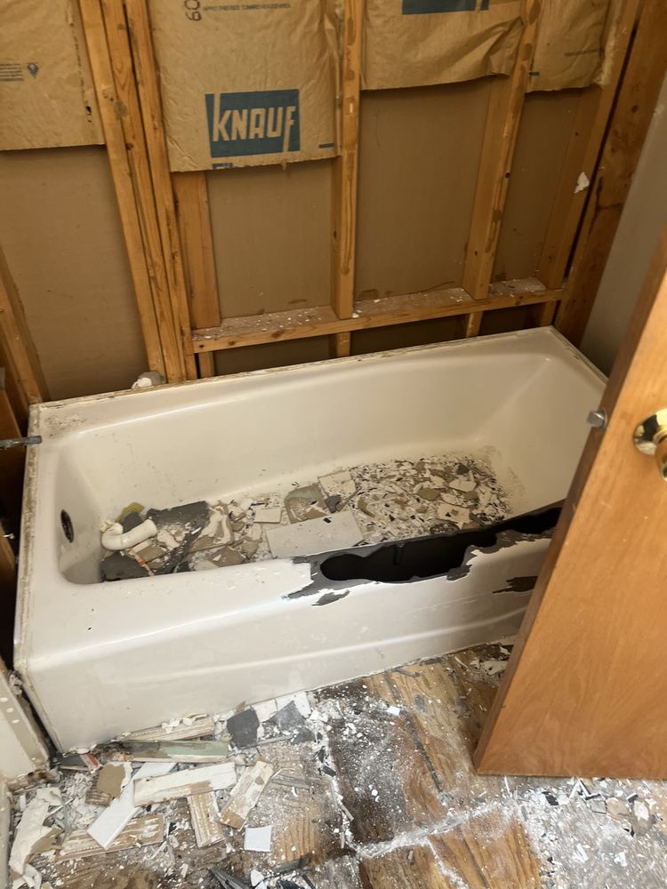 Slide of D&D plumbing and Remodeling