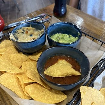 The Taco Shop - Three dip appetizer and chips - Mexican Near Me - Ashburn, Virginia The Taco Shop - Three dip appetizer and chips - Mexican Near Me - Ashburn, Virginia