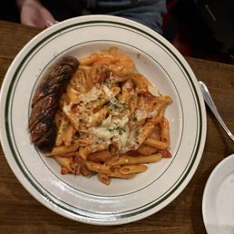 Gluten free penne pasta and banger sausage Gluten free penne pasta and banger sausage