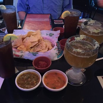 Hoppin Jalapeno - Chips with fresh tomato, habanero, and tomatillo salsas and Tecate with a lime rimmed schooner - Tex-Mex Near Me - Snyder, Oklahoma