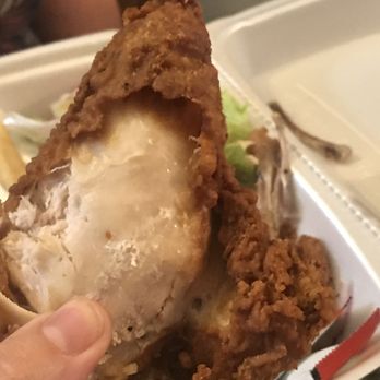 Pizza Power - a hand holding a piece of fried chicken - Pizza Near Me - Philadelphia, Pennsylvania Pizza Power - a hand holding a piece of fried chicken - Pizza Near Me - Philadelphia, Pennsylvania