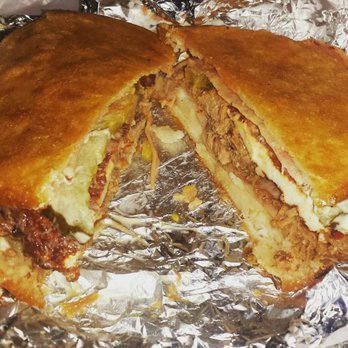 Patacon Pisao - Cubana Arepa- Pork, ham,cheese, pickle, spicy mayo - Venezuelan Near Me - Elmhurst, New York Patacon Pisao - Cubana Arepa- Pork, ham,cheese, pickle, spicy mayo - Venezuelan Near Me - Elmhurst, New York