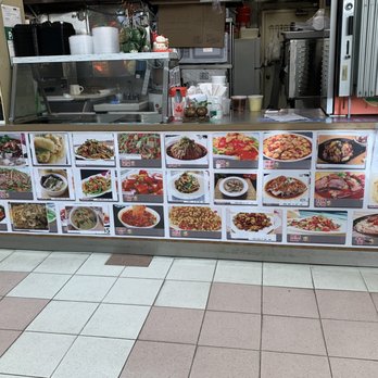 Good Taste & Variety - a restaurant counter with a lot of food on it - Noodles Near Me - Toronto, Ontario