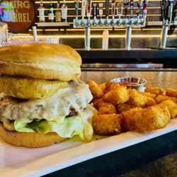 Burg and Barrel - The El Diablo - burger with Carolina Reaper cheese, jalapenos, and habanero hot sauce - ($16.95 as of 06/2025).  Tots highly recommended.