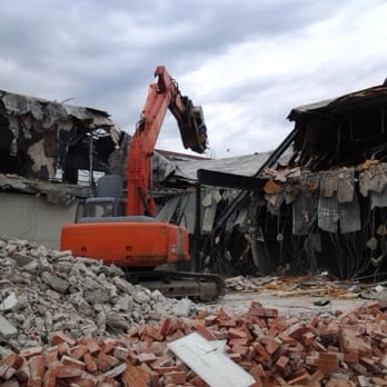 MBR Wrecking - a red excavator working on a pile of rubble - General Contractors Near Me - Skokie, Illinois MBR Wrecking - a red excavator working on a pile of rubble - General Contractors Near Me - Skokie, Illinois