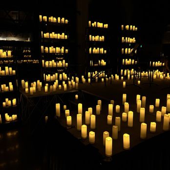 Candlelight Concerts - rows of lit candles in a dark room - Music Venues Near Me - Sacramento, California Candlelight Concerts - rows of lit candles in a dark room - Music Venues Near Me - Sacramento, California
