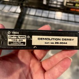 "Demolition Derby" for the ultra obscure Radio Shack TRS-80 computer/gaming console. One of over 40 systems I own! "Demolition Derby" for the ultra obscure Radio Shack TRS-80 computer/gaming console. One of over 40 systems I own!