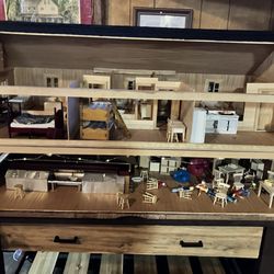 Dreamland Hotel - Doll house in the back (note the "bar" in the lower right hand corner)
