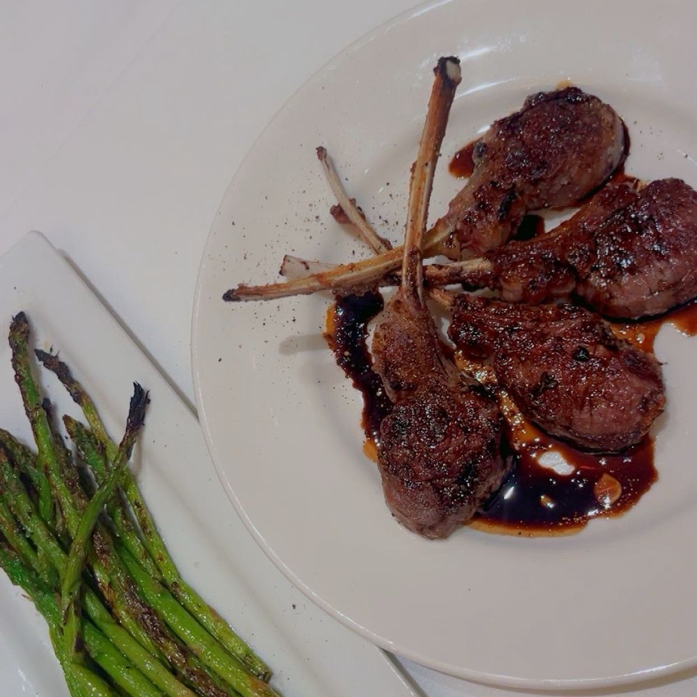 The Capital Grille - Double Cut Lamb Rib Chops (4) with Mint Gremolata Grilled Asparagus with Lemon Mosto - Steakhouses Near Me - Indianapolis, Indiana The Capital Grille - Double Cut Lamb Rib Chops (4) with Mint Gremolata Grilled Asparagus with Lemon Mosto - Steakhouses Near Me - Indianapolis, Indiana