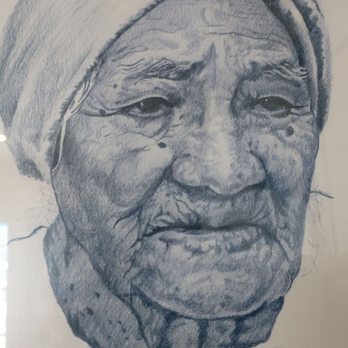 The Rose Garden Restaurant - a drawing of an old woman - Mexican Near Me - Anthony, Texas
