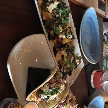STIRR - Avocado Crostini and Brisket Tacos. - Cocktail Bars Near Me - Dallas, Texas STIRR - Avocado Crostini and Brisket Tacos. - Cocktail Bars Near Me - Dallas, Texas