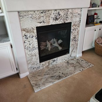 Solomon Moss Tiling - a fireplace in a living room - General Contractors Near Me - San Diego, California Solomon Moss Tiling - a fireplace in a living room - General Contractors Near Me - San Diego, California