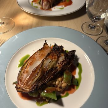 Touché - vegetarian roasted cabbage with rice peas, beans, and strawberry ponzu - French Near Me - Syracuse, New York Touché - vegetarian roasted cabbage with rice peas, beans, and strawberry ponzu - French Near Me - Syracuse, New York