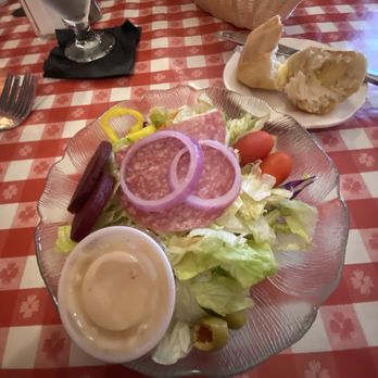 Rosa's Squeeze Inn - Generous Antipasto salad, house dressing and bread basket, delicious! - Italian Near Me - Millersburg, Michigan Rosa's Squeeze Inn - Generous Antipasto salad, house dressing and bread basket, delicious! - Italian Near Me - Millersburg, Michigan