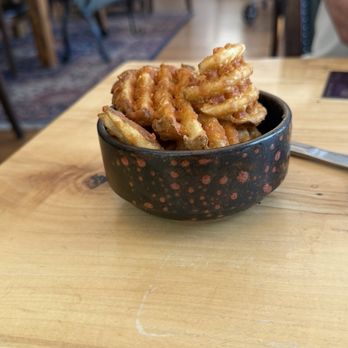 Brunch & - Beautiful pottery bowl filled with pretty decent waffle fries that accompanied my husbands sandwich - Breakfast & Brunch Near Me - Estes Park, Colorado