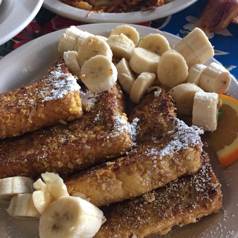 Beach Break Cafe - Seriously?! Almond slices and corn flake crusted French toast. Bananas and whipped cream added bonus. - Breakfast & Brunch Near Me - Oceanside, California