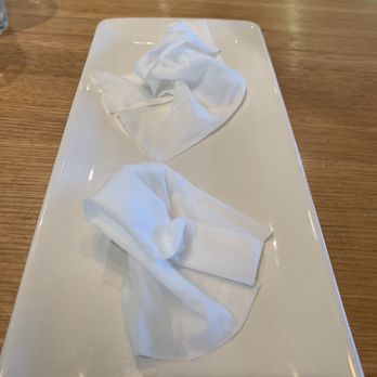 Earls Kitchen + Bar - Wet napkins to sanitize before meal - New American Near Me - Somerville, Massachusetts
