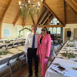 Foothills Congregational Church UCC-Los Altos - Pastor David & Wedding coordinator Nathalie at a wedding reception.