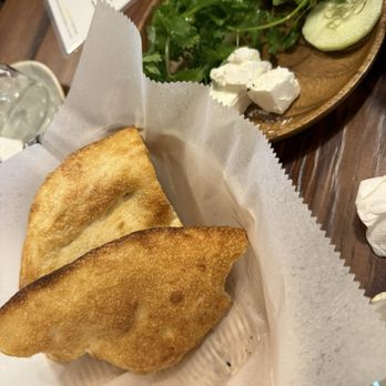 Arash Persian Grill - fresh bread , herbs (sabzi) and feta cheese appetizer - Persian/Iranian Near Me - Richardson, Texas
