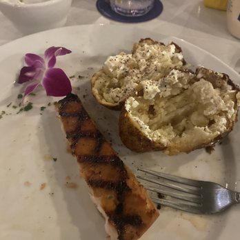 12A Buoy - Caribbean Mahi, baked potato and a flower garnish - Seafood Near Me - Fort Pierce, Florida 12A Buoy - Caribbean Mahi, baked potato and a flower garnish - Seafood Near Me - Fort Pierce, Florida
