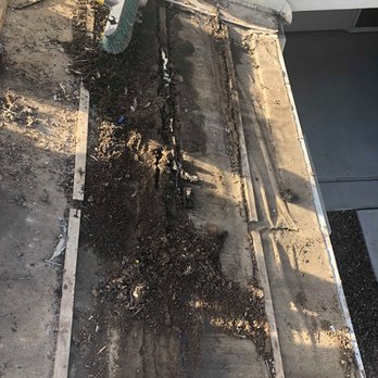 Aspect Roofing - This was roof debris over time it accumulated, underlayment over time created buckles and started ripping because water constantly hit it - Roofing Near Me