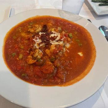 Saluda's - Shrimp and grits. Delish. This was an amazing dish. I've usually had it with the white rue, but this was tomato based. Highly recommend. - New American Near Me - Columbia, South Carolina Saluda's - Shrimp and grits. Delish. This was an amazing dish. I've usually had it with the white rue, but this was tomato based. Highly recommend. - New American Near Me - Columbia, South Carolina