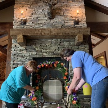 Karen's Flower Shoppe - adding flower garlands to transform a crazy antlered chair into a throne. - Florists Near Me - Cairo, New York Karen's Flower Shoppe - adding flower garlands to transform a crazy antlered chair into a throne. - Florists Near Me - Cairo, New York