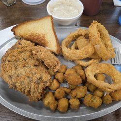 Chicken fried steak, crisp fried okra, hand battered onion rings, toast and gravy on the side.