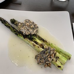 One World - Grilled asparagus, preserved lemon vinaigrette, seed cracker