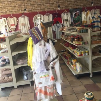 Abugeda Grocery - a display of clothing in a store - Grocery Near Me - Dallas, Texas Abugeda Grocery - a display of clothing in a store - Grocery Near Me - Dallas, Texas