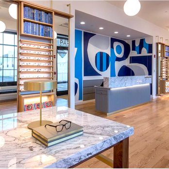 Becker Works - an eyeglass store with a marble countertop - General Contractors Near Me - Chicago, Illinois Becker Works - an eyeglass store with a marble countertop - General Contractors Near Me - Chicago, Illinois