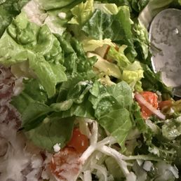 Chopped salad that was not chopped with terrible tasting over salty garlic dressing Chopped salad that was not chopped with terrible tasting over salty garlic dressing