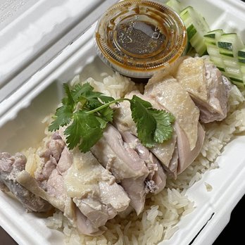 Three Roosters - Hainanese Chicken with ginger rice. - Thai Near Me - New York, New York Three Roosters - Hainanese Chicken with ginger rice. - Thai Near Me - New York, New York