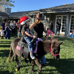 The birthday boy on his first pony ride