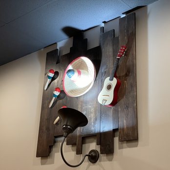 Fiesta Mexican Restaurant - a guitar and a mirror on the wall - Mexican Near Me - Pasco, Washington