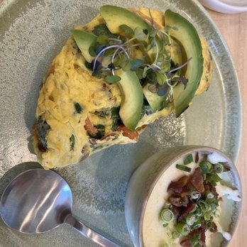 Egg Posh - Avocado bacon omelette with grits and rye toast - Breakfast & Brunch Near Me - Frisco, Texas