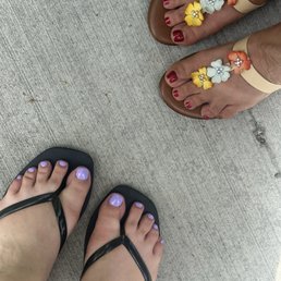 Lavender gel pedicure and a glitter red regular pedicure