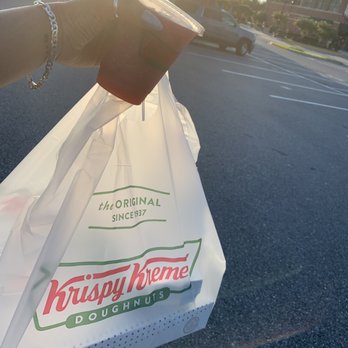 Krispy Kreme - One dozen original glaze , two chocolate glaze and two strawberry smoothies yummy - Donuts Near Me - Frederick, Maryland