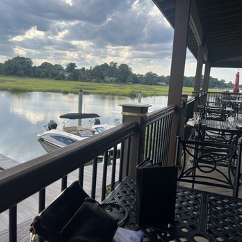 Decoys Seafood - Patio table overlooking the marsh - Seafood Near Me - Suffolk, Virginia Decoys Seafood - Patio table overlooking the marsh - Seafood Near Me - Suffolk, Virginia